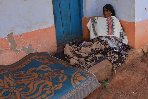 Toda elder Poofsed in the veranda of her house in Artawll Mund.